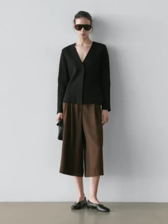 Bermuda lunghi con orlo risvoltato