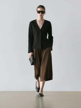 Bermuda lunghi con orlo risvoltato