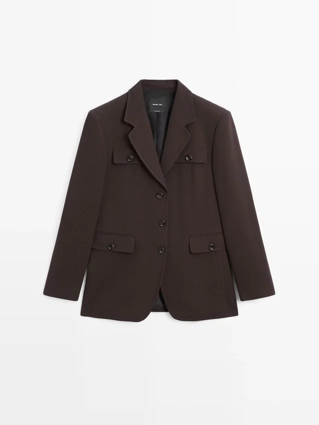 Blazer con tasche e collo a revers Blazer con tasche e collo a revers