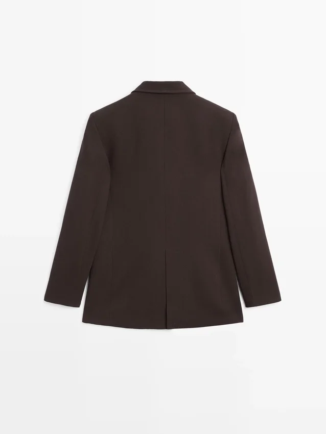 Blazer con tasche e collo a revers Blazer con tasche e collo a revers