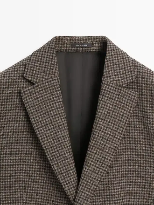 Blazer sartoriale in lana a quadri Blazer sartoriale in lana a quadri