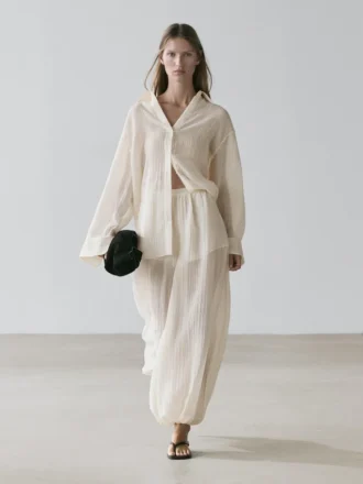 Camicia fluida con dettagli plissettati