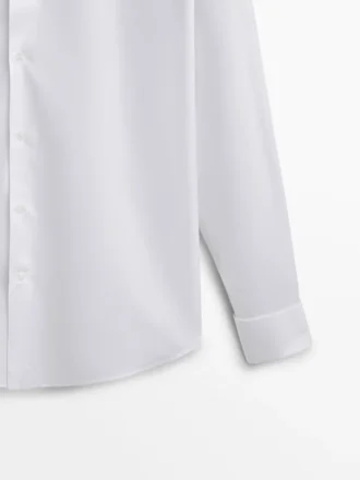 Camicia in cotone slim fit con doppio polsino