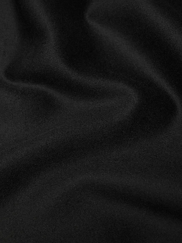 Cappa in maglia mista lana con frange Cappa in maglia mista lana con frange