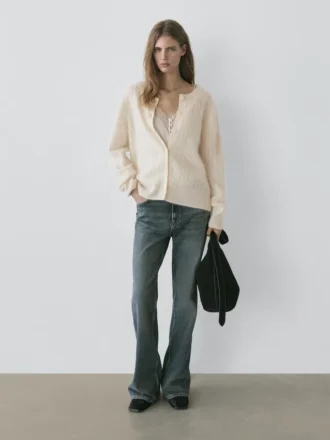 Cardigan in maglia a trecce di lana