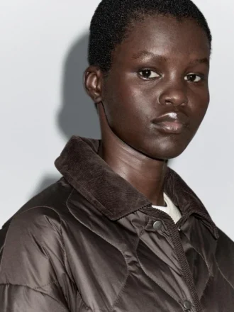 Giacca imbottita idrorepellente con dettagli in velluto a coste