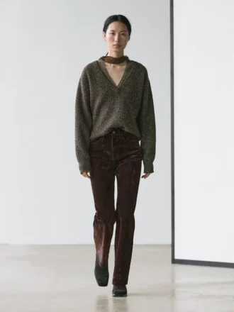 Jeans a vita alta con effetto floccato e taglio bootcut