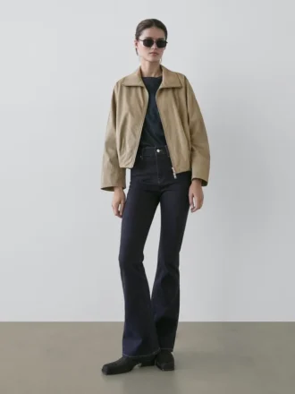 Jeans skinny a vita alta con fondo a campana