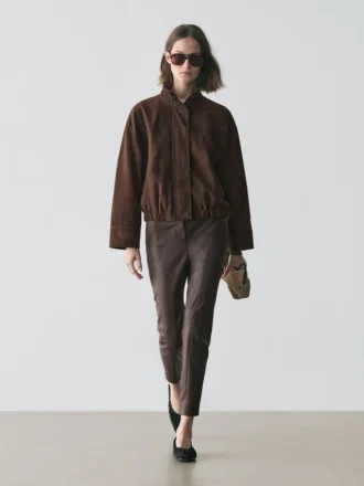 Leggings in pelle nappa con dettagli elasticizzati