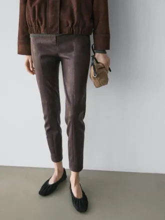 Leggings in pelle nappa con dettagli elasticizzati