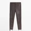 Leggings in pelle nappa con dettagli elasticizzati