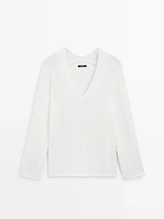 Maglione con scollo a V traforato Maglione con scollo a V traforato