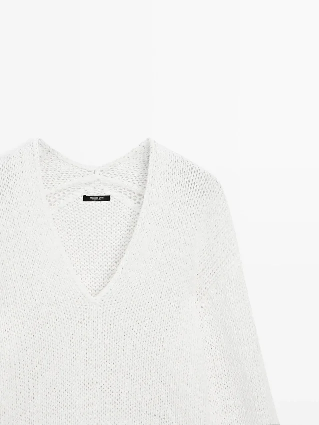 Maglione con scollo a V traforato Maglione con scollo a V traforato