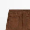 Pantaloni a gamba larga in pelle scamosciata con tasche