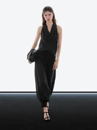 Pantaloni sarouel semitrasparenti con dettagli a bottoni