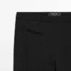 Pantaloni svasati con tasche