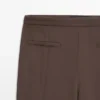 Pantaloni svasati con tasche