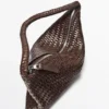 Piccola borsa a tracolla in pelle intrecciata
