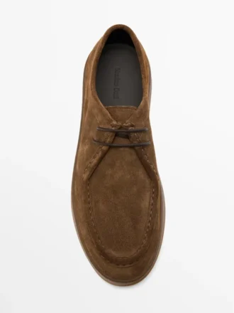 Scarpe in pelle con punta moc e suola spessa