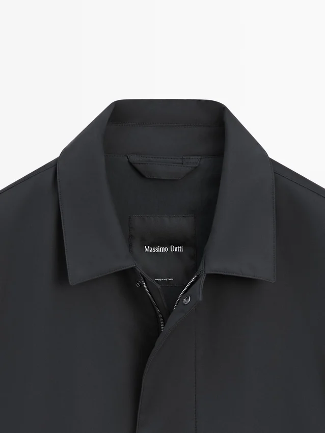 Trench in tessuto idrorepellente Trench in tessuto idrorepellente