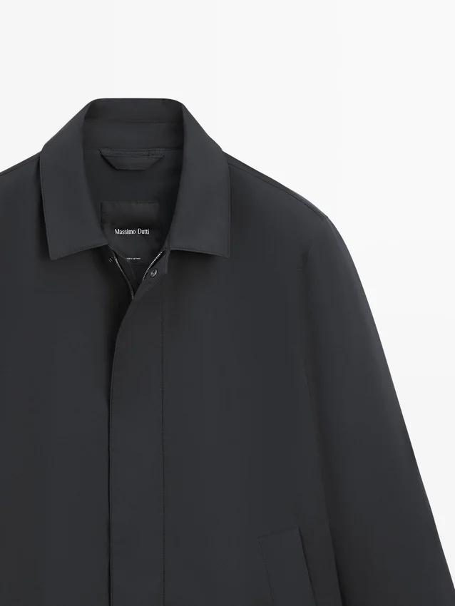 Trench in tessuto idrorepellente Trench in tessuto idrorepellente